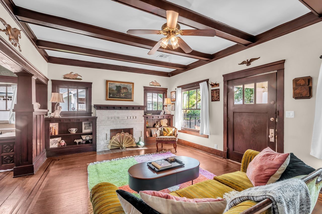 2608 Hopkins Street Houston, TX 77006 - Photo 4 of 42 a living room with furniture and a fireplace