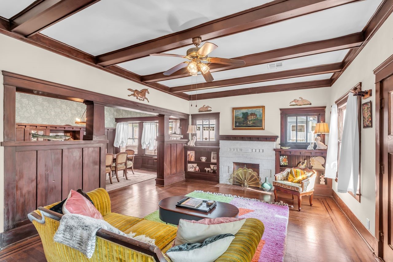 2608 Hopkins Street Houston, TX 77006 - Photo 6 of 42 a living room with furniture fireplace and a flat screen tv
