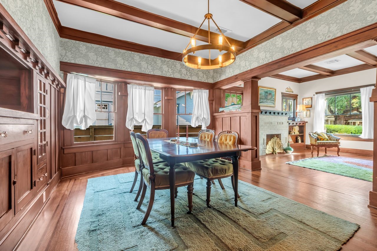 2608 Hopkins Street Houston, TX 77006 - Photo 9 of 42 a view of a dining room with furniture window and wooden floor