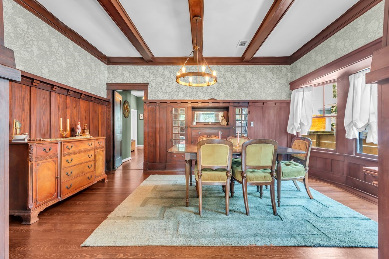 2608 Hopkins Street Houston, TX 77006 - Photo 10 of 42 a view of a dining room with furniture window and wooden floor