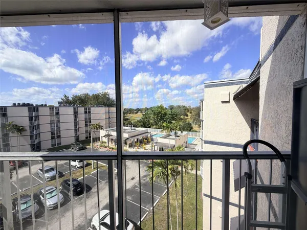 a view of a balcony with city view