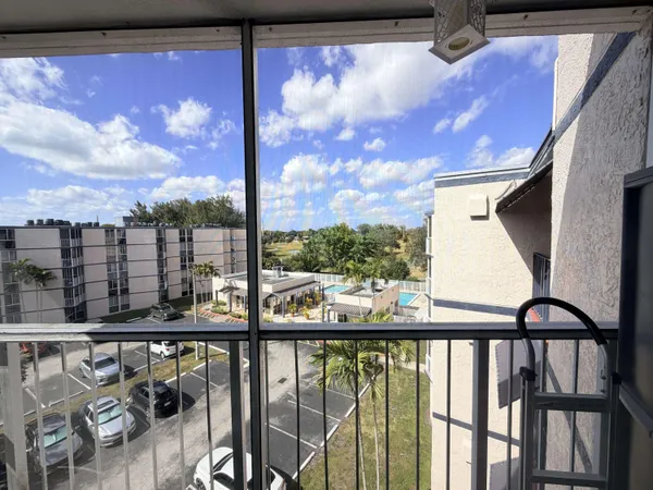 a view of a balcony with city view