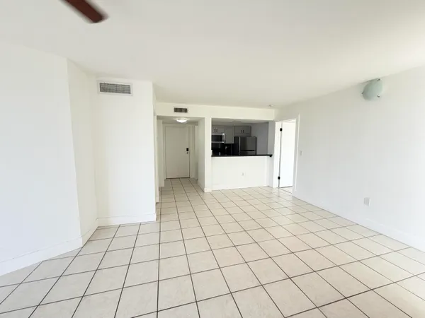 a view of an empty room and window