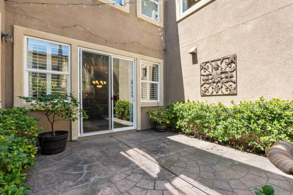 2667 Fallsview Road San Marcos, CA 92078 - Photo 18 of 54 a view of a building with potted plants