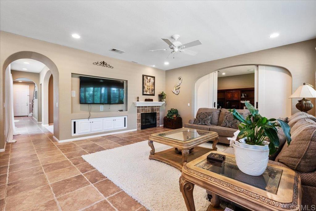 2667 Fallsview Road San Marcos, CA 92078 - Photo 20 of 54 a living room with furniture and a flat screen tv