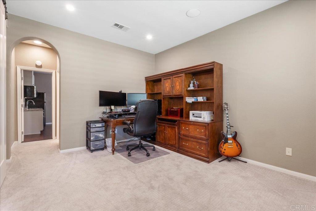 2667 Fallsview Road San Marcos, CA 92078 - Photo 28 of 54 a view of workspace with a computer on a desk