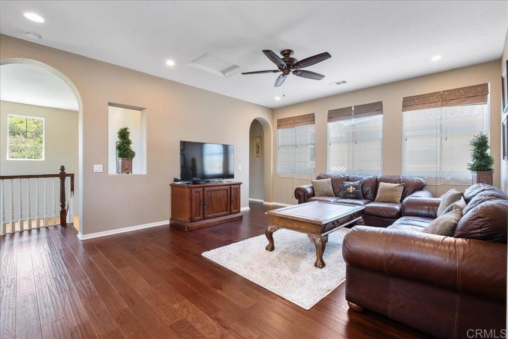 2667 Fallsview Road San Marcos, CA 92078 - Photo 35 of 54 a living room with furniture and a flat screen tv