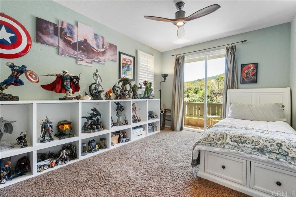 2667 Fallsview Road San Marcos, CA 92078 - Photo 37 of 54 a bedroom with a bed and a window
