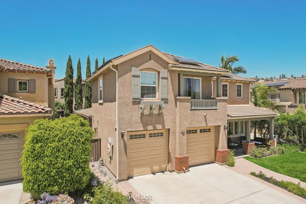 2667 Fallsview Road San Marcos, CA 92078 - Photo 4 of 54 a front view of a house with a garden
