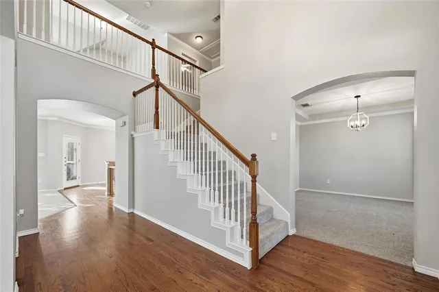 a view of entryway with wooden floor
