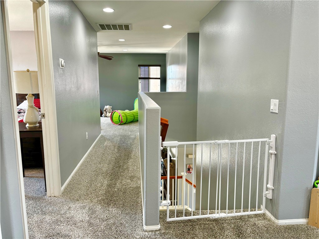 1005 Garrett Way San Jacinto, CA 92583 - Photo 16 of 29 a view of hallway with seating