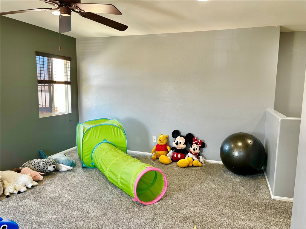 1005 Garrett Way San Jacinto, CA 92583 - Photo 17 of 29 a room with toys and a chandelier