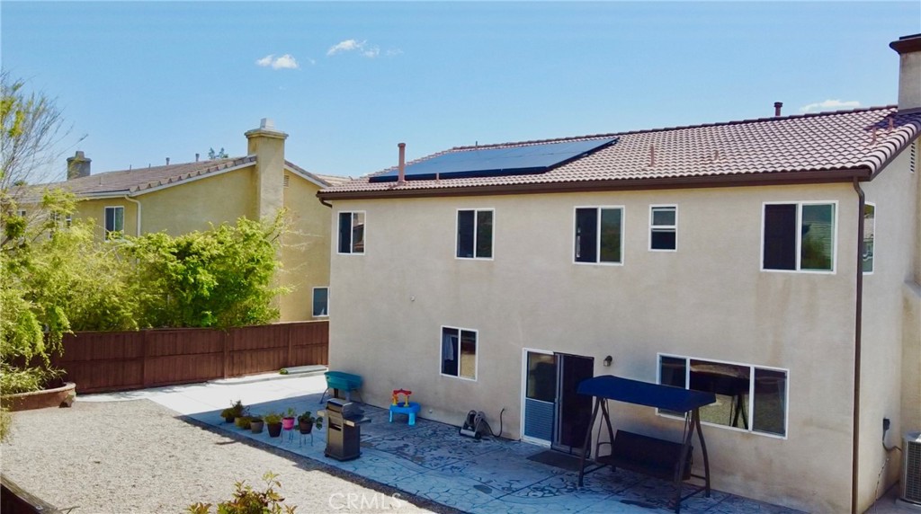 1005 Garrett Way San Jacinto, CA 92583 - Photo 3 of 29 a front view of a house with patio