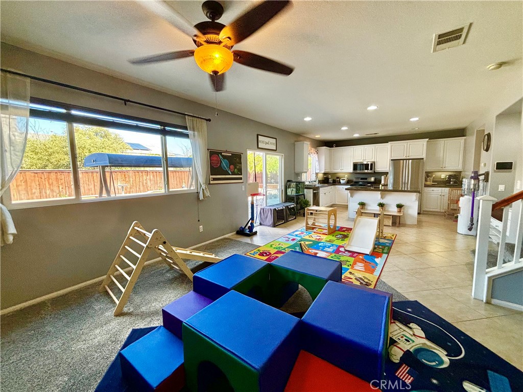 1005 Garrett Way San Jacinto, CA 92583 - Photo 6 of 29 a view of a dining room with furniture