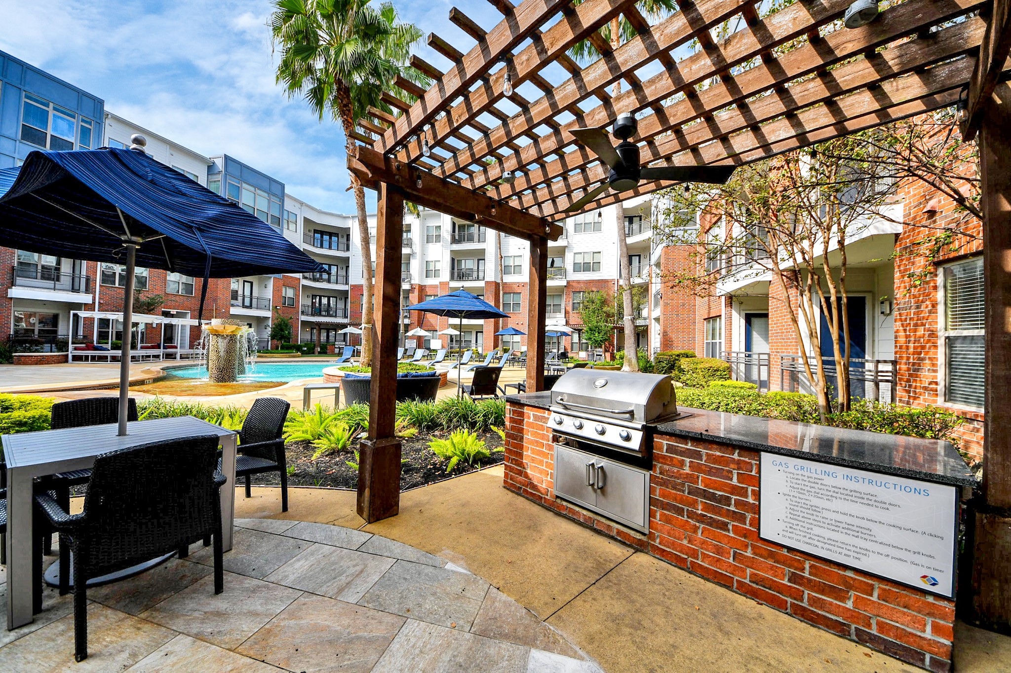 5455 Richmond Avenue, Unit 3046 Houston, TX 77056 - Photo 13 of 50 a view of a chairs and tables in the patio