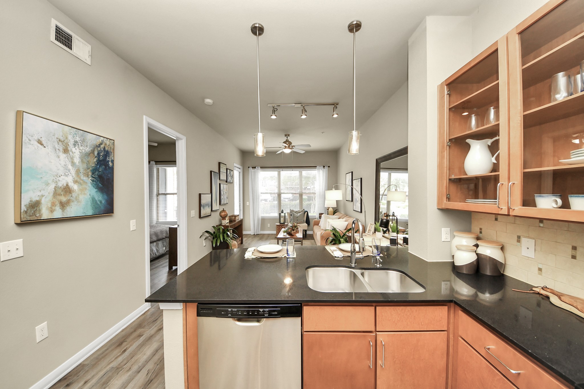 5455 Richmond Avenue, Unit 3046 Houston, TX 77056 - Photo 32 of 50 a kitchen with a sink appliances and a counter top space