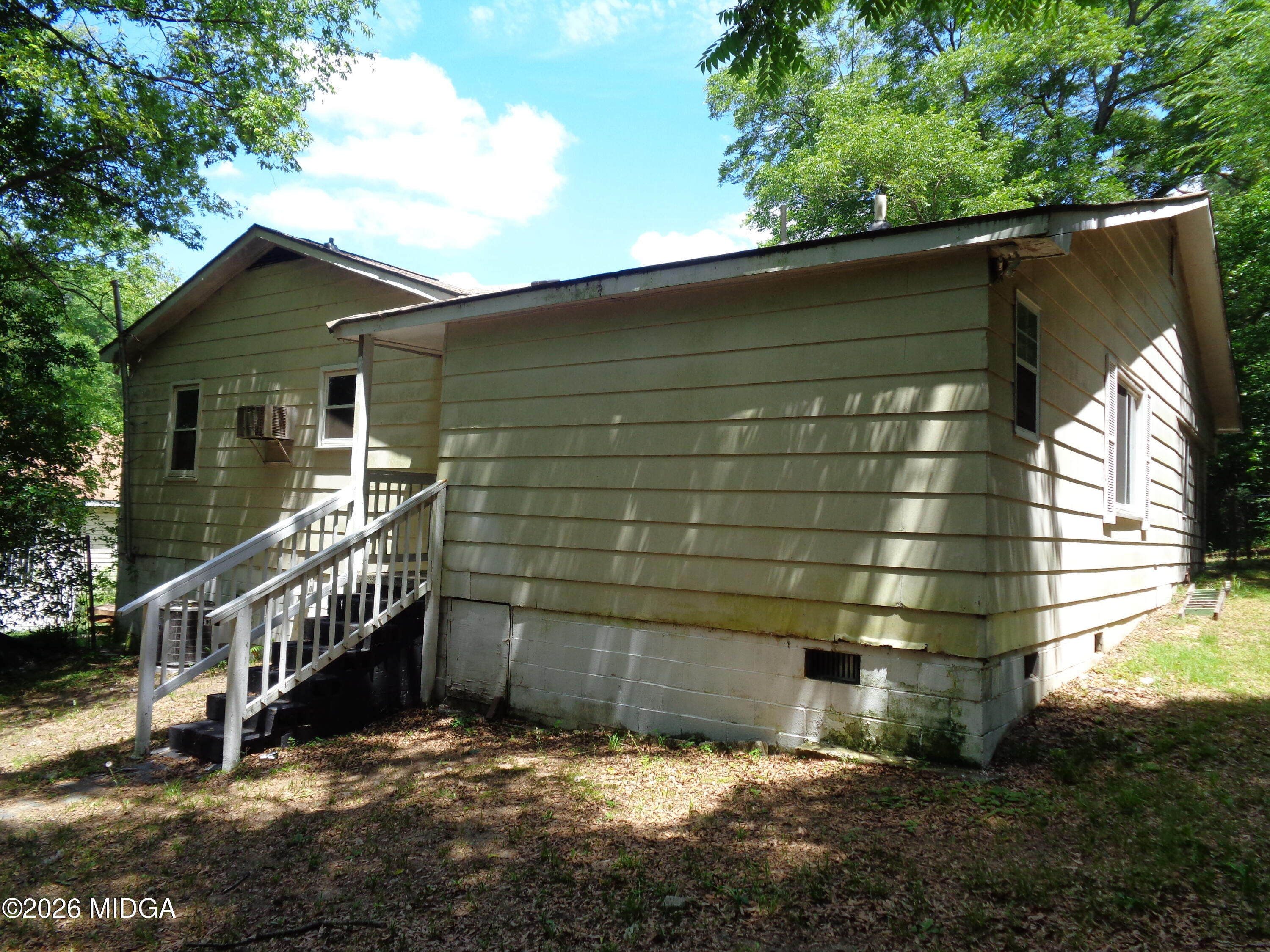 3380 Goodwin Lane Macon, GA 31217 - Photo 22 of 22 a view of a house with a yard