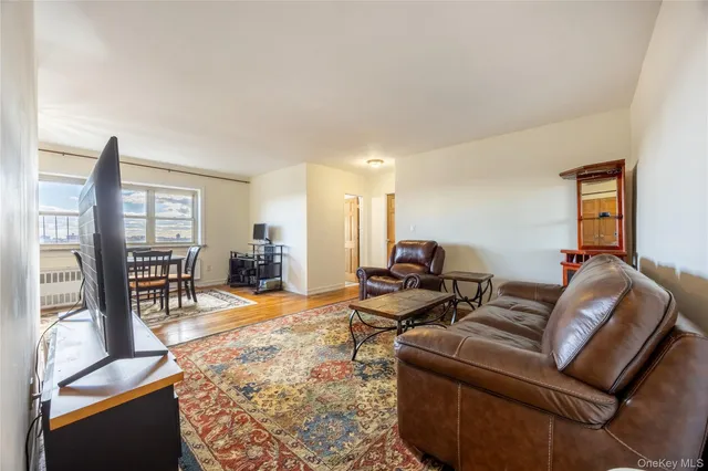a living room with furniture and a table