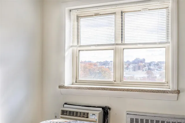 a view of a room that has a window