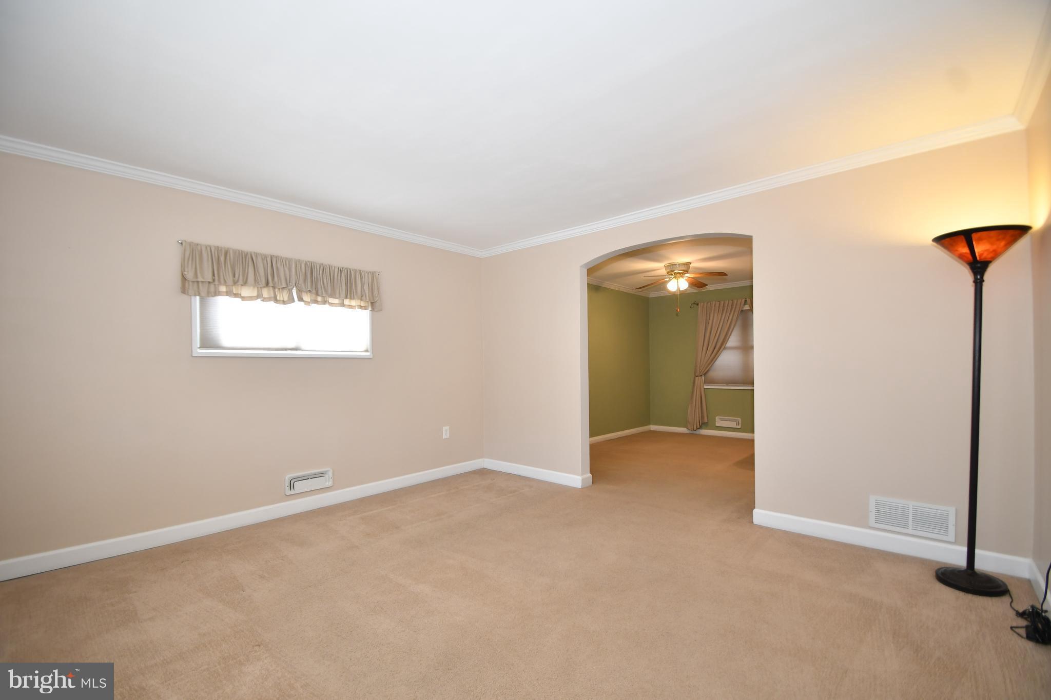 1962 Holborn Road Baltimore, MD 21222 - Photo 7 of 30 an empty room with windows and closet