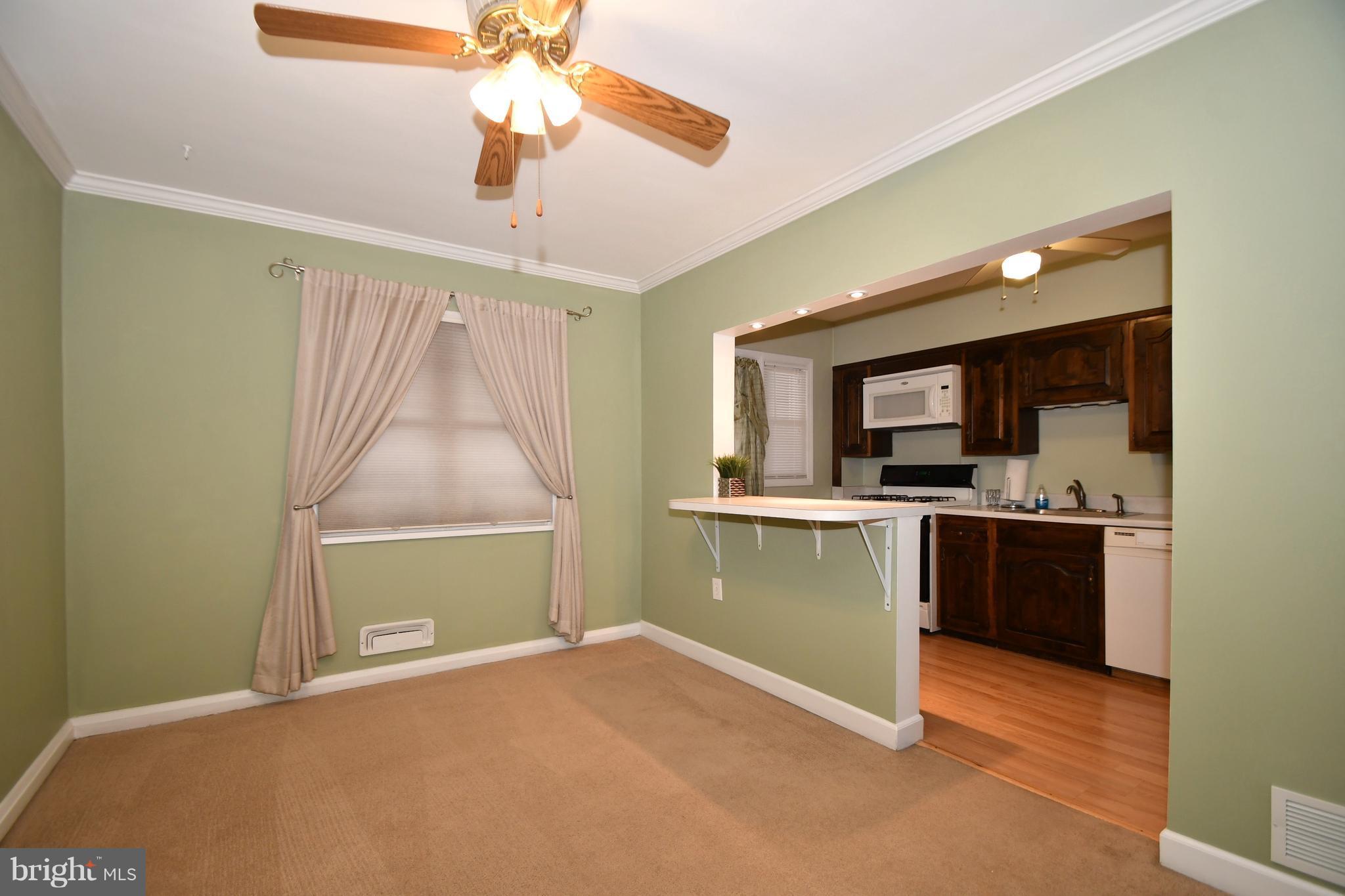 1962 Holborn Road Baltimore, MD 21222 - Photo 9 of 30 a bedroom with a bed and a television