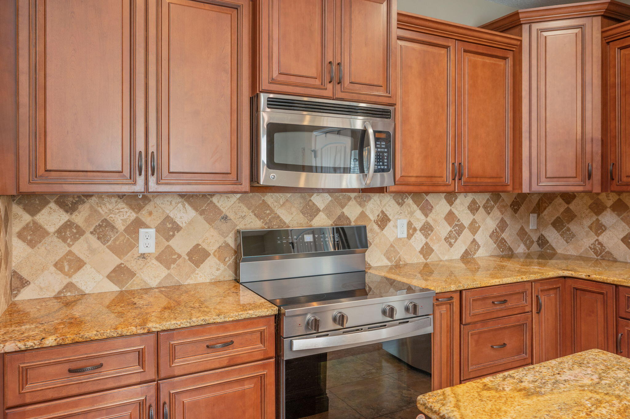 3720 Kittrell Lane Crestview, FL 32539 - Photo 15 of 39 Kitchen with tilesd backsplash