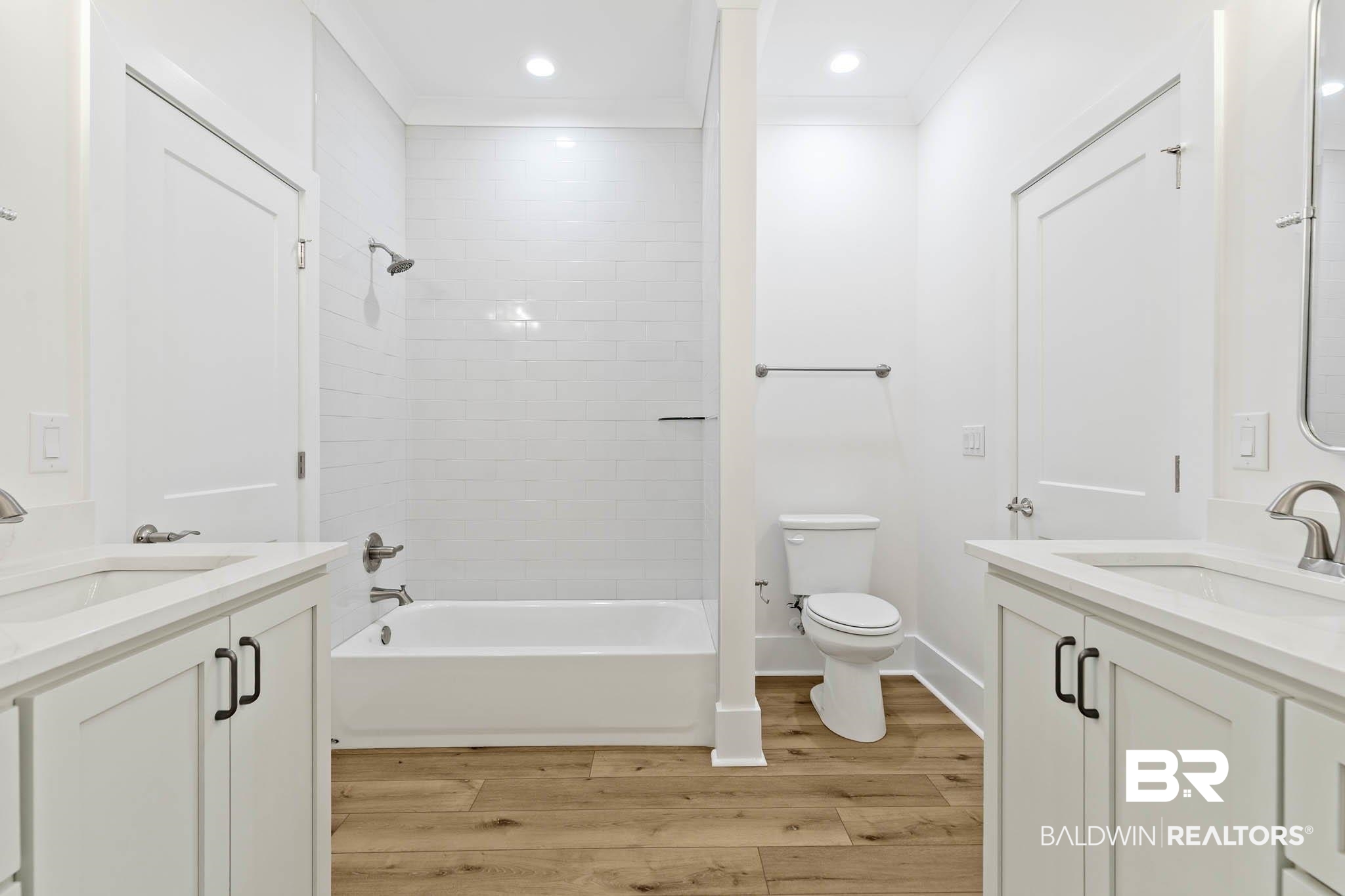 6656 Garrison Drive Daphne, AL 36527 - Photo 40 of 57 Full bath featuring vanity, light wood-type flooring, ornamental molding, recessed lighting, and shower / bathtub combination