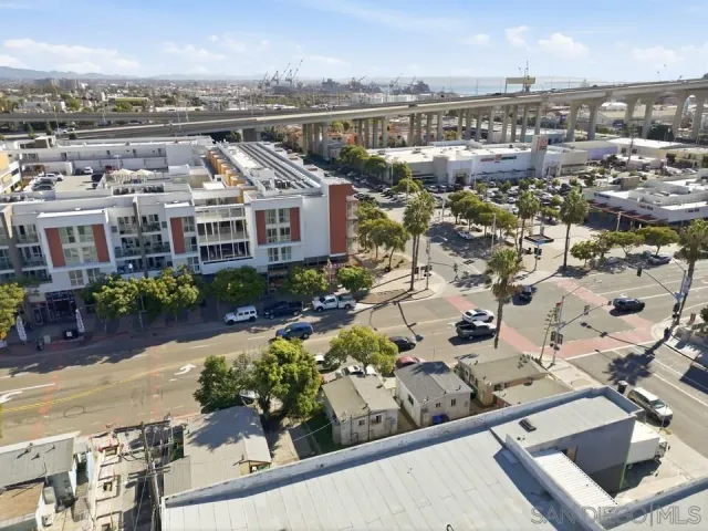 an aerial view of a house with a yard and garden