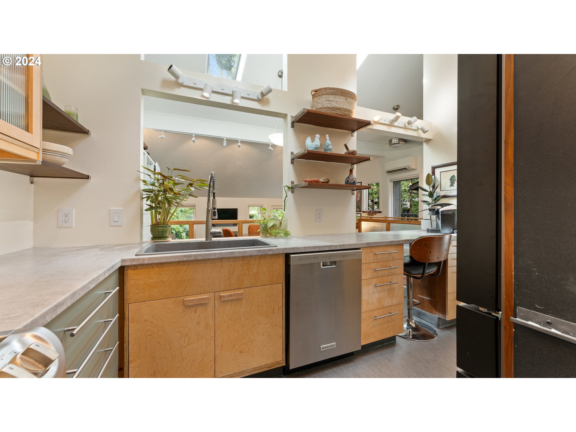 132 Brae Burn Drive Eugene, OR 97405 - Photo 16 of 42 a kitchen with stainless steel appliances a sink and cabinets