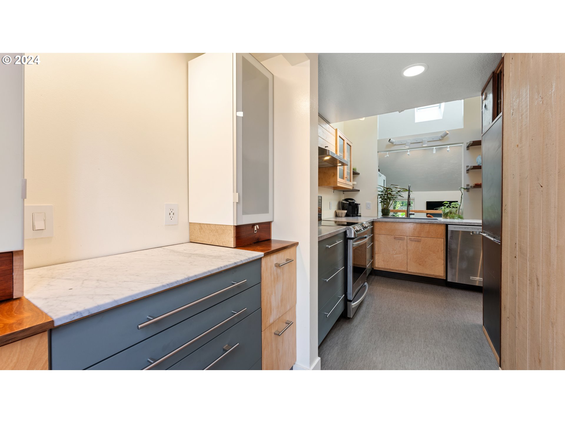 132 Brae Burn Drive Eugene, OR 97405 - Photo 20 of 42 a kitchen with a sink cabinets and stainless steel appliances