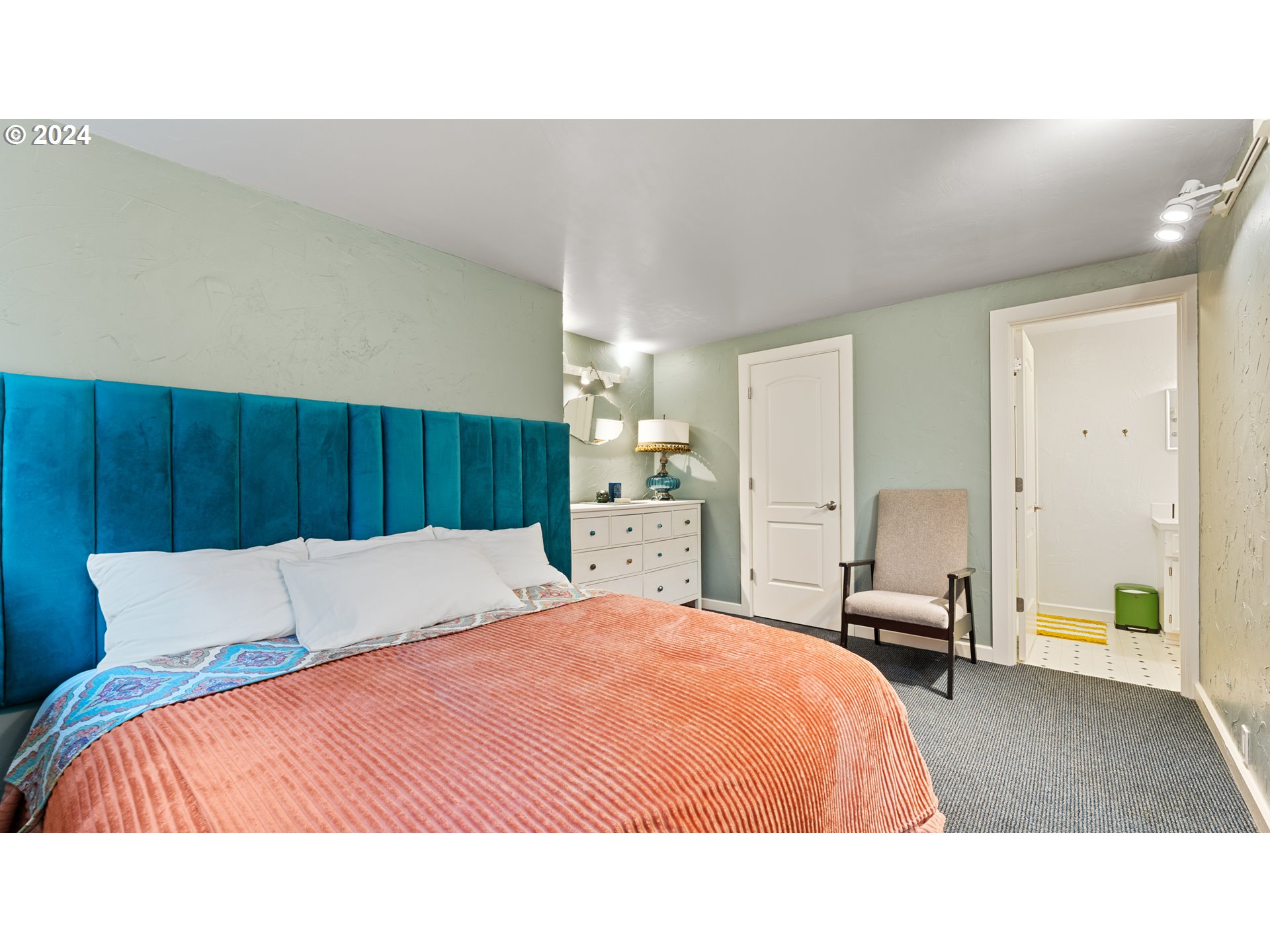 132 Brae Burn Drive Eugene, OR 97405 - Photo 27 of 42 a bedroom with a bed and a dresser