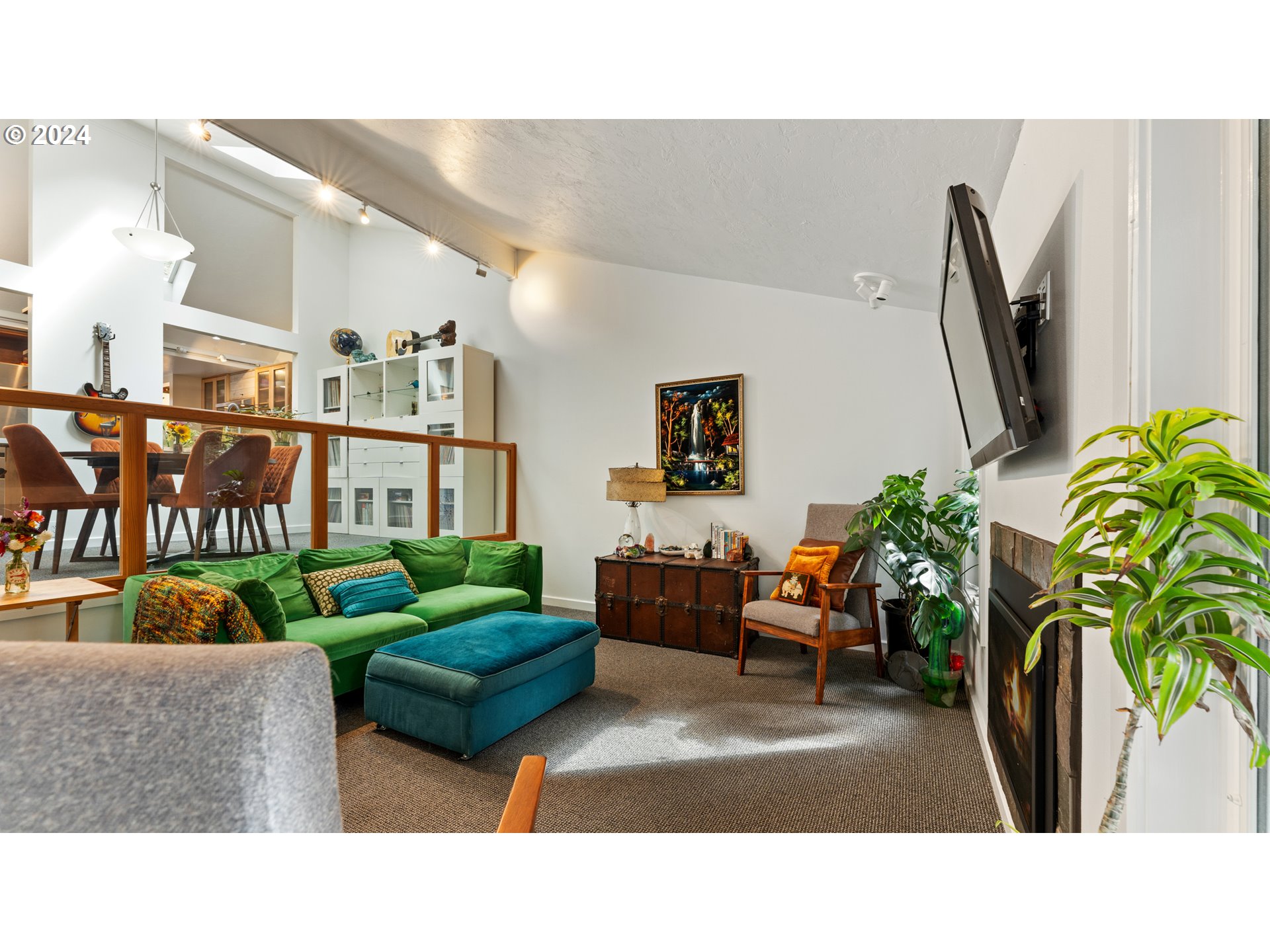 132 Brae Burn Drive Eugene, OR 97405 - Photo 10 of 42 a living room with furniture and a flat screen tv