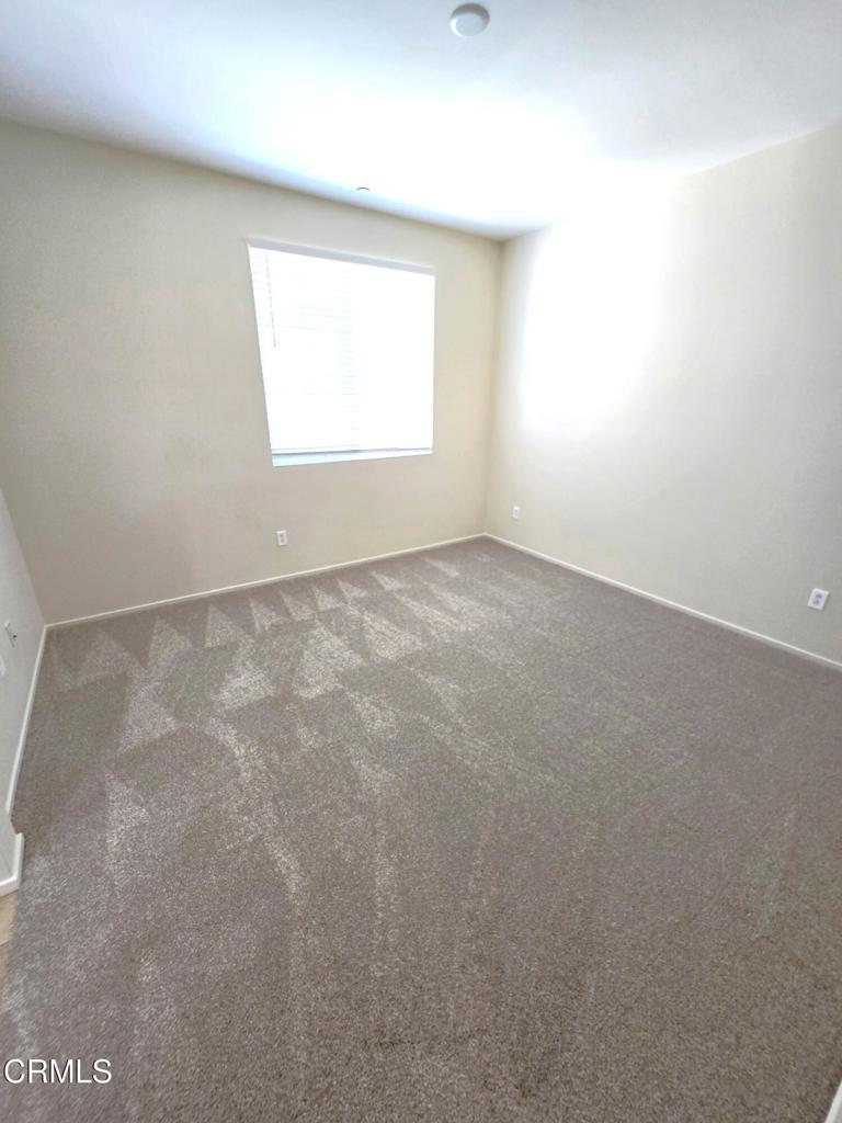 3319 North Ventura Road Oxnard, CA 93036 - Photo 12 of 25 an empty room with a window