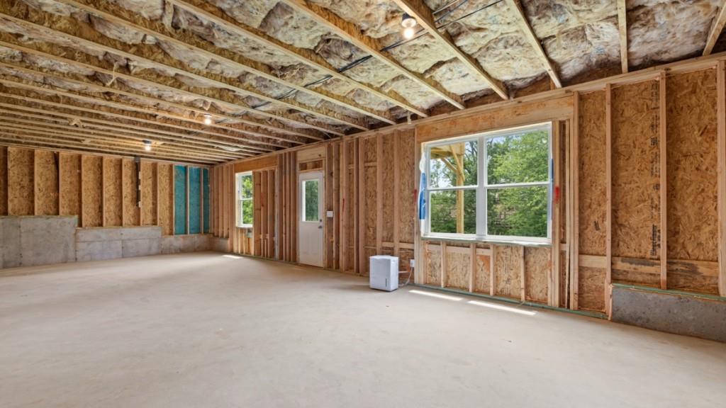 174 Thompson Ridge Lane Dallas, GA 30132 - Photo 30 of 35 a view of an empty room with a balcony