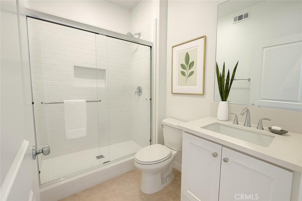 349 Proctor Irvine, CA 92618 - Photo 6 of 14 a bathroom with a shower a sink and a mirror