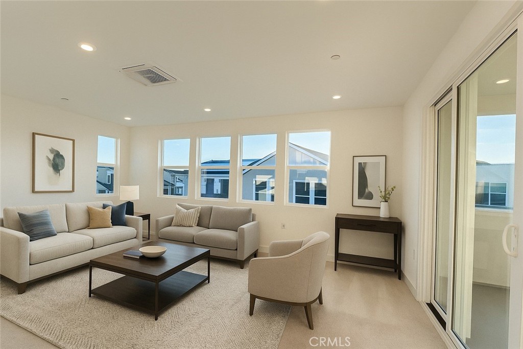 349 Proctor Irvine, CA 92618 - Photo 10 of 14 a living room with furniture and a large window