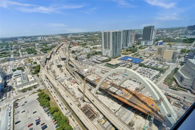 a view of a city with tall buildings