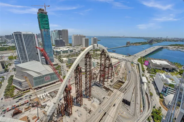 a view of a city with an ocean