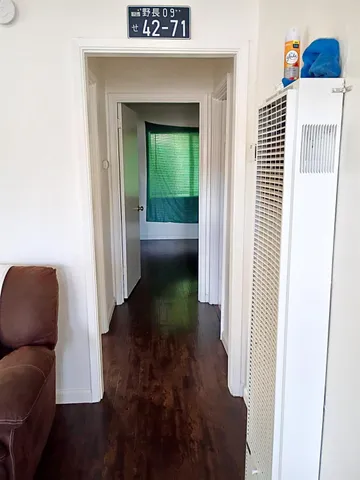 a view of livingroom furniture and a entryway