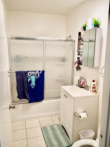 a bathroom with a bathtub and a sink