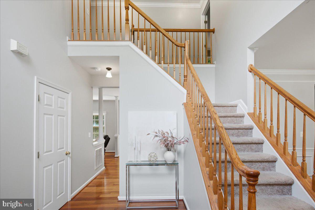 2424 Springbrook Court Huntingtown, MD 20639 - Photo 17 of 103 a view of entryway and hall with wooden floor