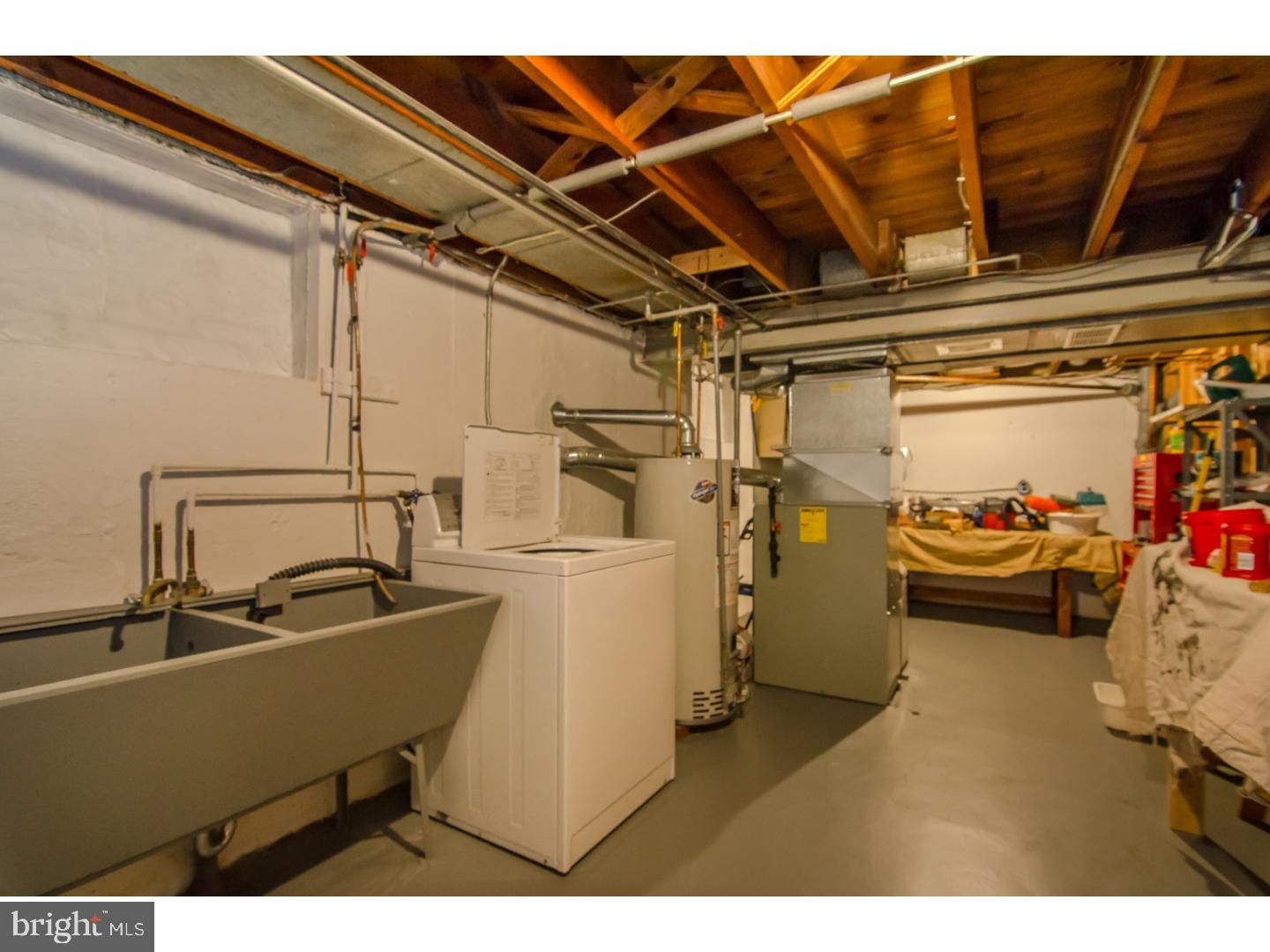473 Harwicke Road Springfield, PA 19064 - Photo 22 of 25 a utility room with dryer and washer