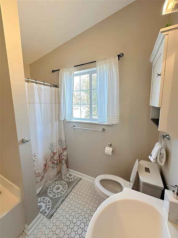4151 Nelson Road Lake Wales, FL 33898 - Photo 18 of 32 a bathroom with a granite countertop sink and a mirror