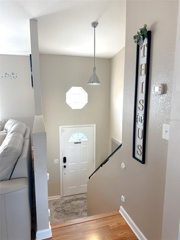 4151 Nelson Road Lake Wales, FL 33898 - Photo 5 of 32 a view of a hallway with paintings on the wall