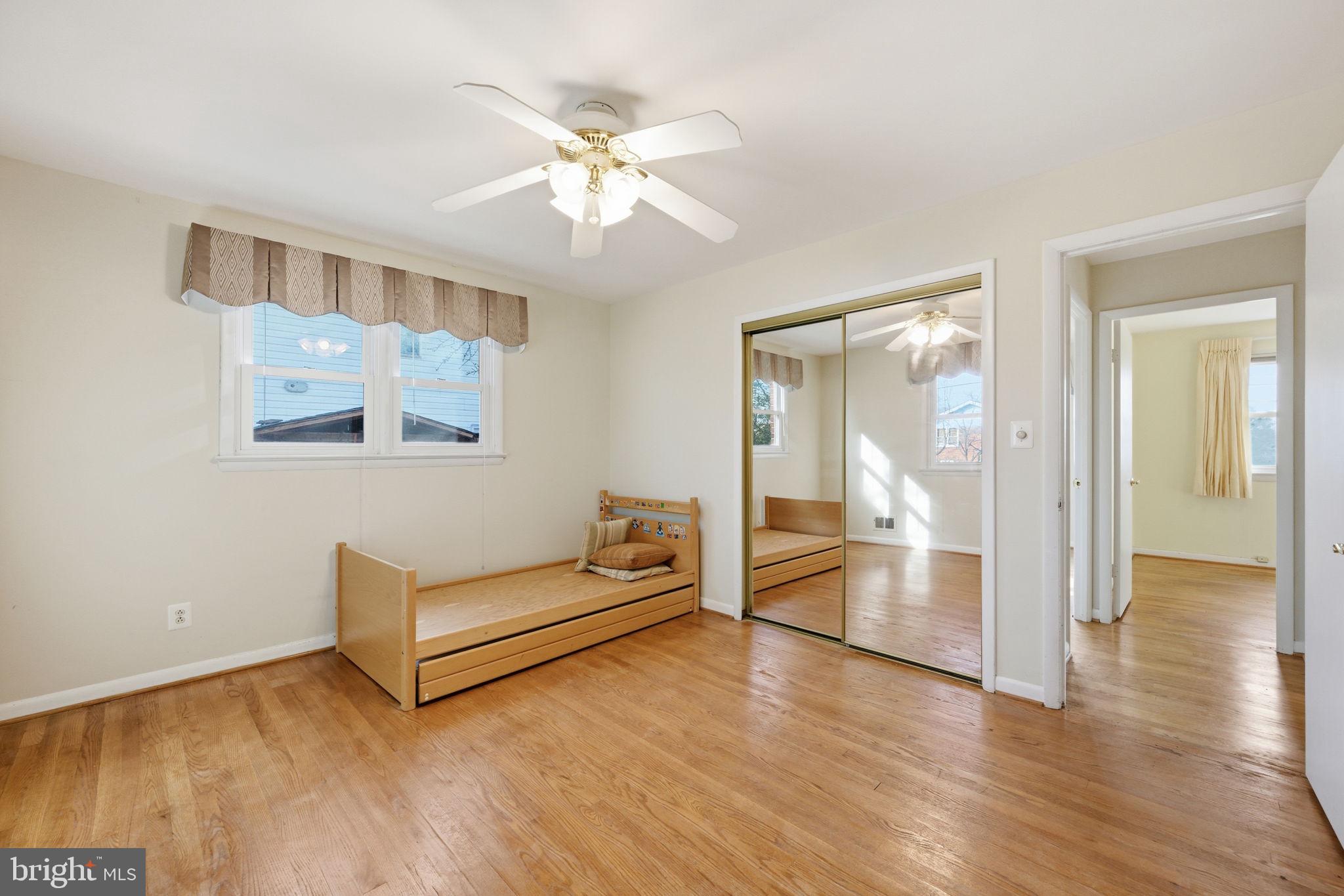 1721 University Boulevard West Silver Spring, MD 20902 - Photo 18 of 38 a view of a livingroom with wooden floor and furniture