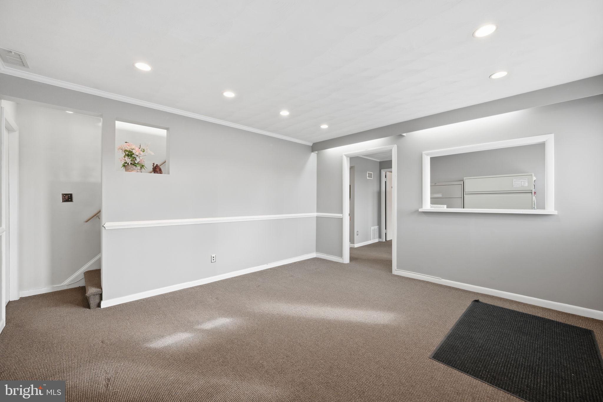 1721 University Boulevard West Silver Spring, MD 20902 - Photo 27 of 38 a view of an empty room with a window