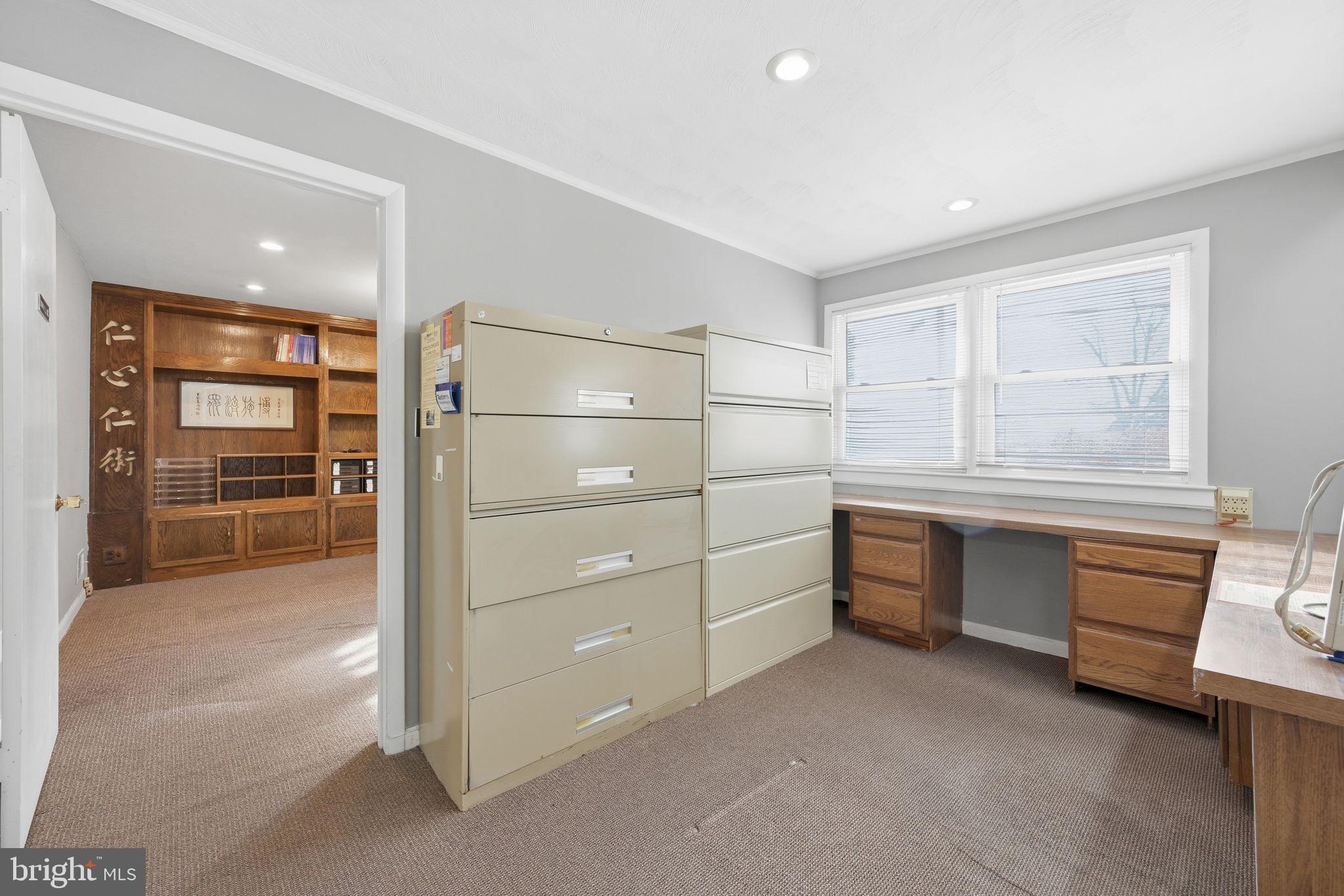 1721 University Boulevard West Silver Spring, MD 20902 - Photo 28 of 38 a room with furniture and a window