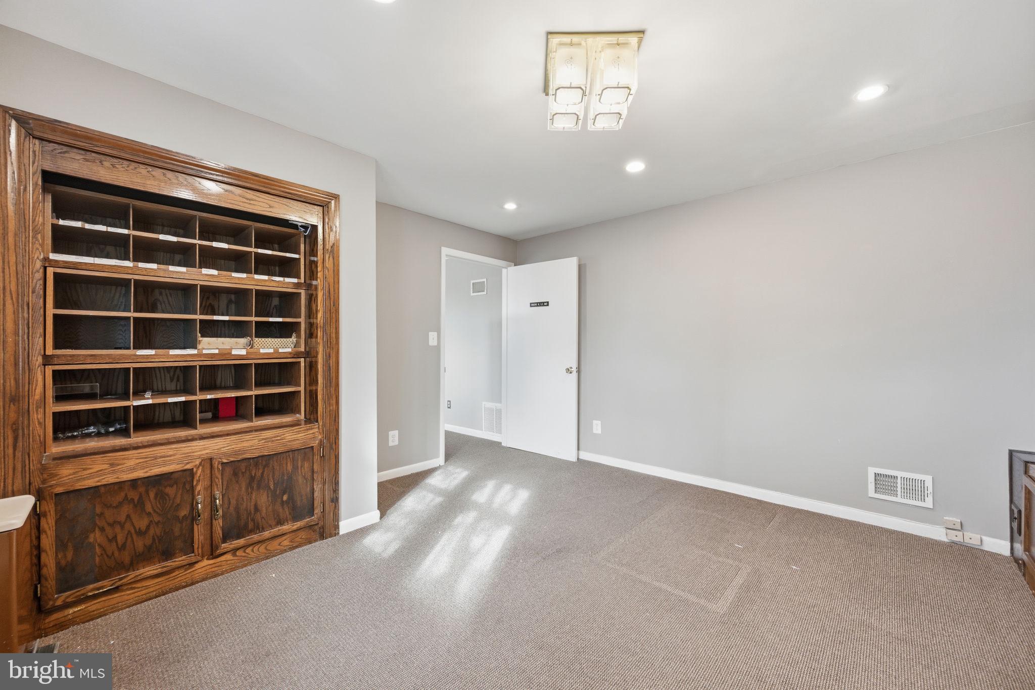 1721 University Boulevard West Silver Spring, MD 20902 - Photo 31 of 38 a view of an empty room with a window