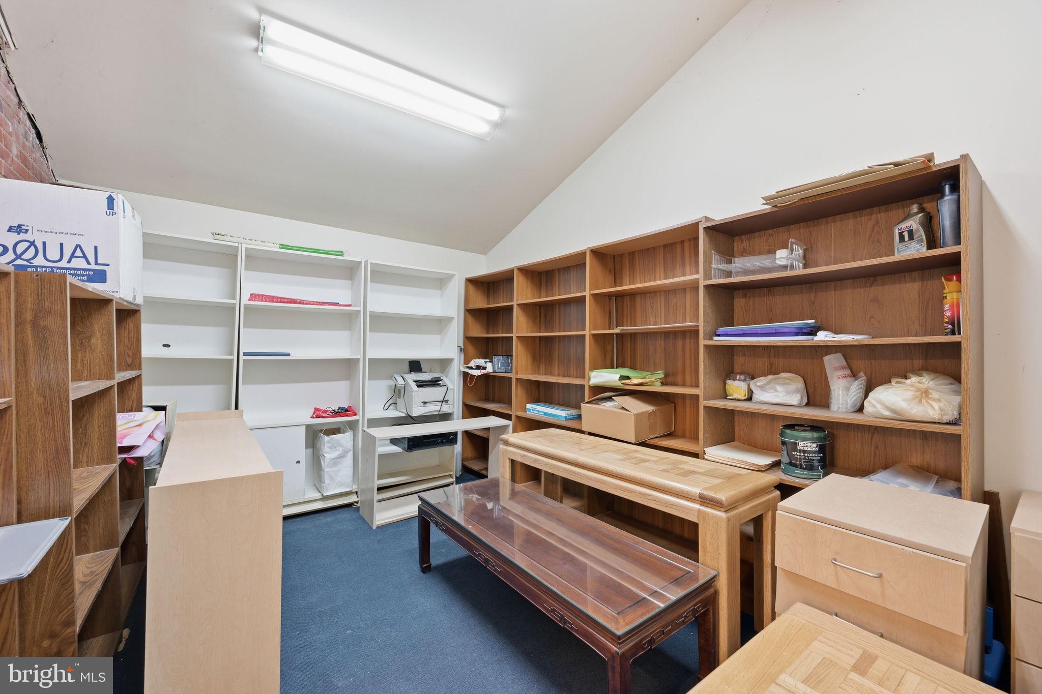 1721 University Boulevard West Silver Spring, MD 20902 - Photo 33 of 38 a view of workspace with wooden floor and cabinet