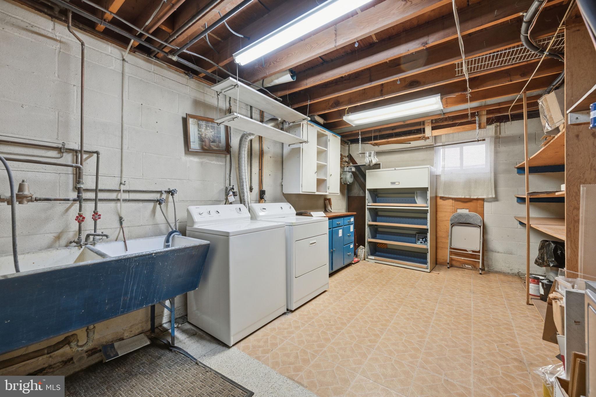 1721 University Boulevard West Silver Spring, MD 20902 - Photo 34 of 38 a utility room with multiple dryer and washer